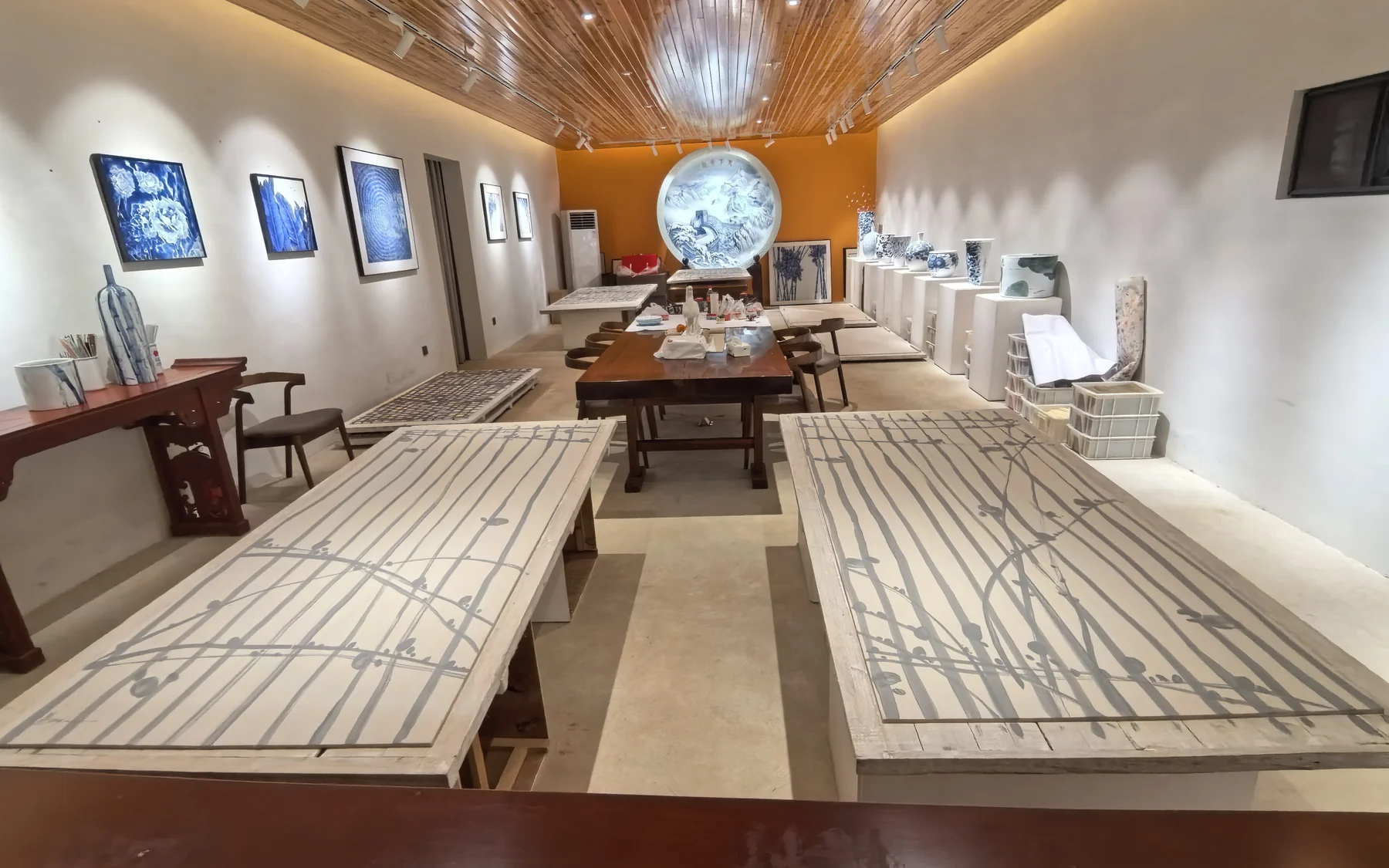 Multiple porcelain panels in a long interior